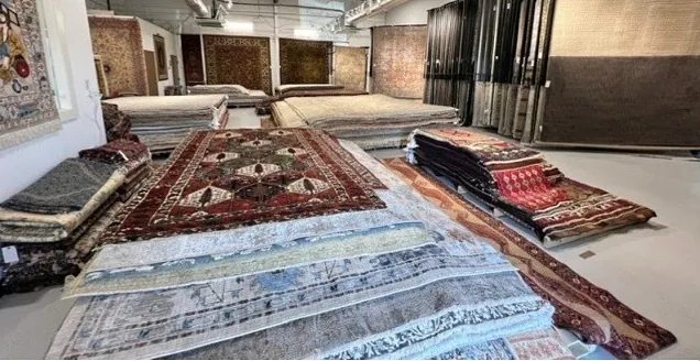 A selection of rugs in a store